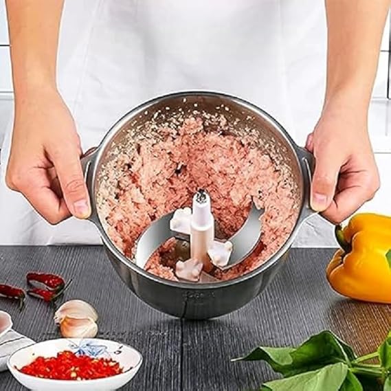 meat grinder and mincer that minces and grinds meat, vegetables, and spices.